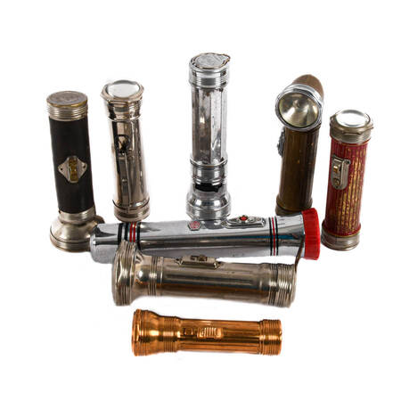 Grouping of Eight Aluminum Flashlights from the 1920s to 1950s