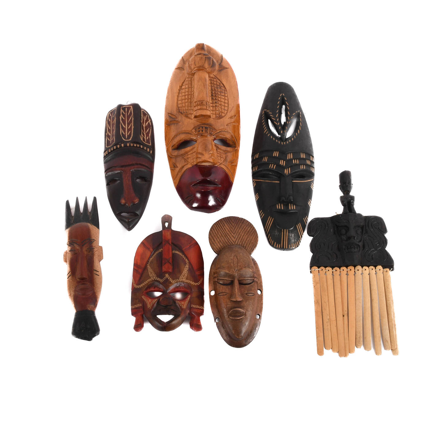 Grouping of Seven Wood Carved African Mask