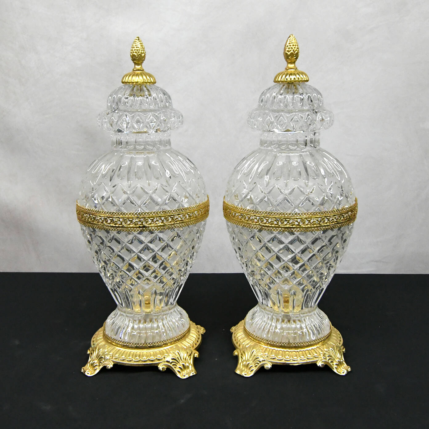 Pair of Molded Frosted Glass Lidded Urns on Gold Footed Bases