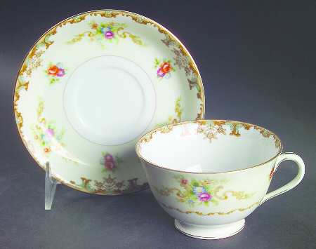 Regal Footed Cup & Saucer Set by Aladdin