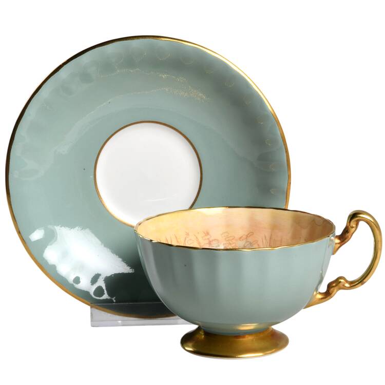 1034 Turquoise Footed Cup & Saucer Set