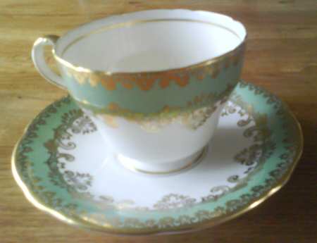 1057 Footed Cup & Saucer Set