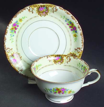 Patricia Brown Footed Cup & Saucer Set