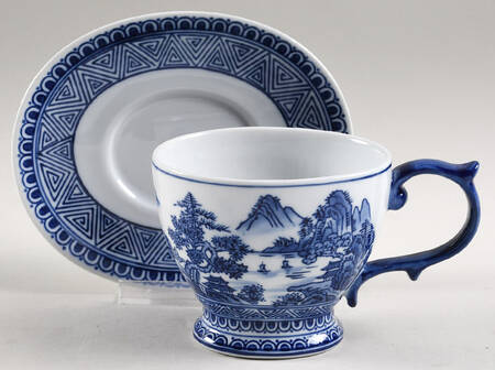 Four Mountains Footed Cup & Saucer Set