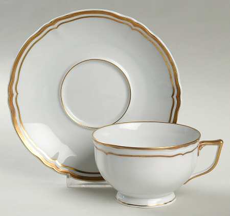 Louis XV Gold Footed Cup & Saucer Set