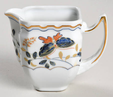Papillons Creamer