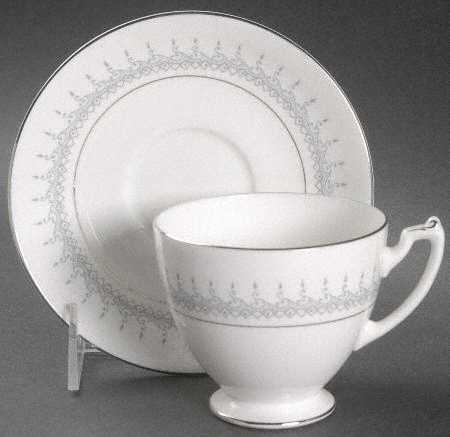 Avon Footed Cup & Saucer Set