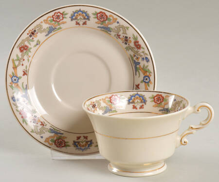 Brocade (American) Footed Cup & Saucer Set by Community