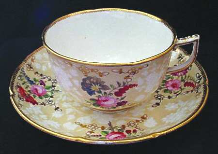 COA129 Footed Cup & Saucer Set