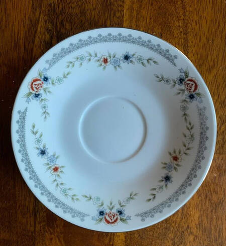 Melody (Coupe, 2006) Saucer