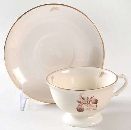 Brown Iris Footed Cup & Saucer Set by Lunning, Frederik