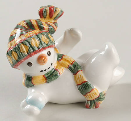 The Flurries Feet Up Tumbling Santa Figurine