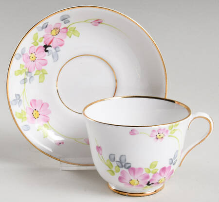 25c Footed Cup & Saucer Set