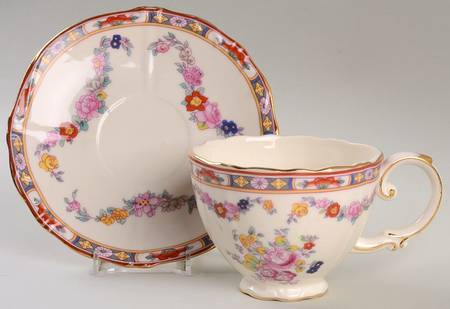 Chinese Bouquet Footed Cup & Saucer Set