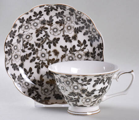 Dainty Footed Cup & Saucer Set