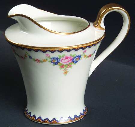 H330 (Yellow Rim, White Center) Creamer