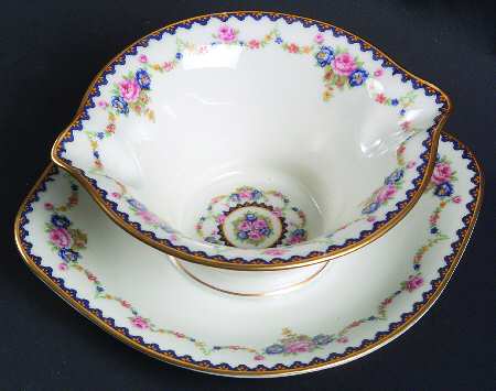 H330 (Yellow Rim, White Center) Gravy Boat with Attached Underplate
