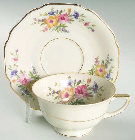 HC11 (Cream Background) Footed Cup & Saucer Set