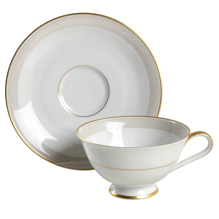 Spinning Footed Cup & Saucer Set