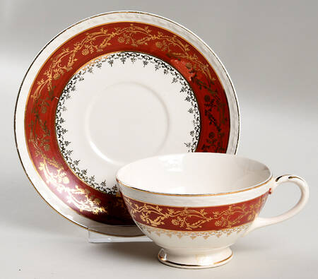 Formal Rust Red Footed Cup & Saucer Set