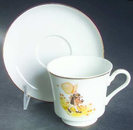 Girl with Cat Footed Cup & Saucer Set