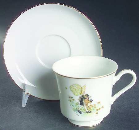 Girl with Cat Footed Cup & Saucer Set