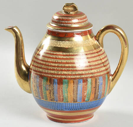 Thousand Faces Teapot & Lid