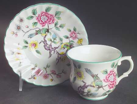 Chinese Rose Footed Cup & Saucer Set