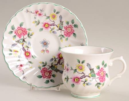 Chinese Rose Footed Cup & Saucer Set