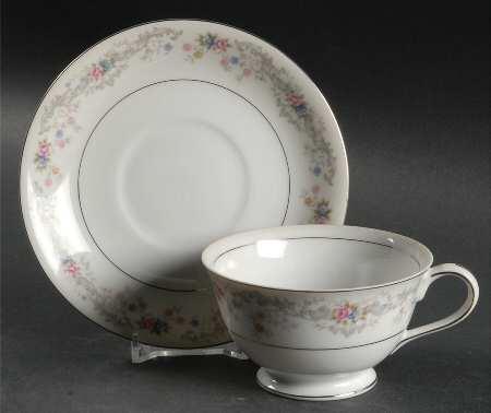 Rose Point Footed Cup & Saucer Set
