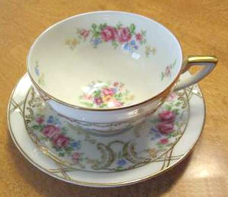 Beauty Rose Footed Cup & Saucer Set