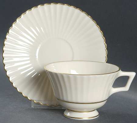 Colonnade Gold Footed Cup & Saucer Set