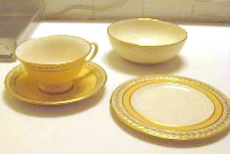 Fontaine Yellow (Embossed Gold Laurel) Footed Cup & Saucer Set