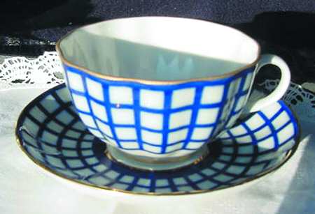 Quatro Flat Cup & Saucer Set