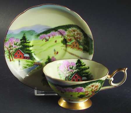 Four Seasons Footed Cup & Saucer Set