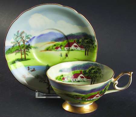 Four Seasons Footed Cup & Saucer Set