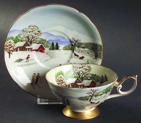 Four Seasons Footed Cup & Saucer Set