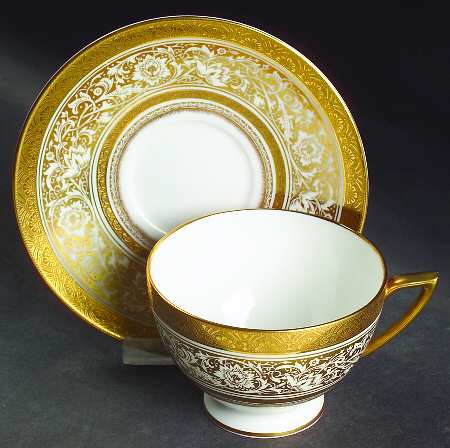 Porcelain Ball Ivory Footed Cup & Saucer Set