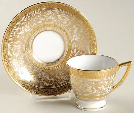 Porcelain Ball Ivory Footed Demitasse Cup & Saucer Set