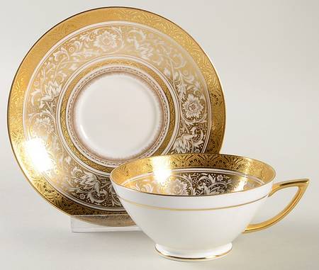 Porcelain Ball Ivory Footed Cup & Saucer Set
