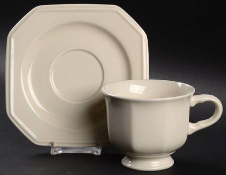 Continental Ivory Footed Cup & Saucer Set