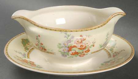 The Hollyhock Gravy Boat with Attached Underplate