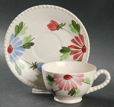 MOV1  Footed Cup & Saucer Set