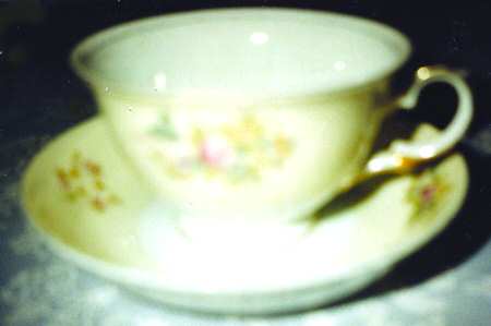 MEI946 Footed Cup & Saucer Set