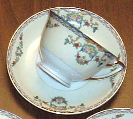 MEI993 Footed Cup & Saucer Set