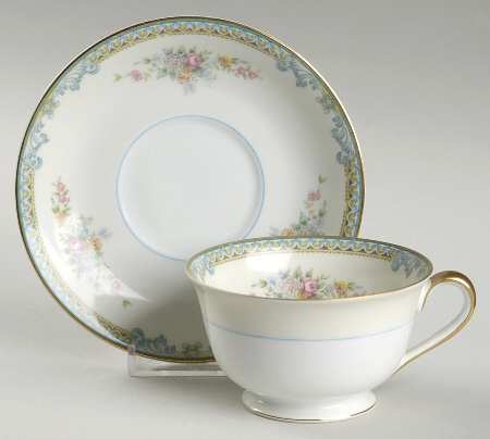 Avon Footed Cup & Saucer Set