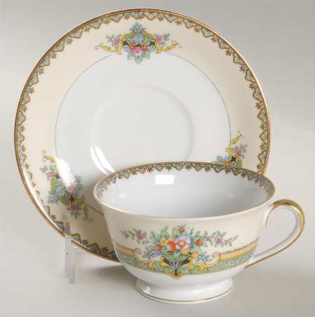 Mystery #116 Footed Cup & Saucer Set
