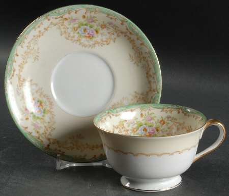 Mystery #136 Footed Cup & Saucer Set