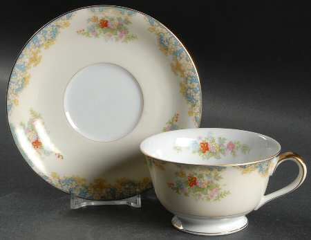 Mystery #210 Footed Cup & Saucer Set