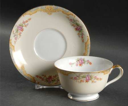 Mystery #207b Footed Cup & Saucer Set